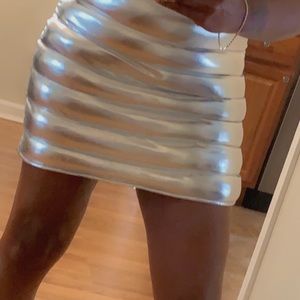 Super cute Silver skirt. Just restocked size medium!